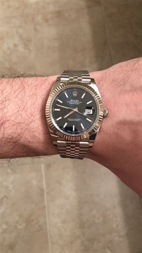 wearing a rolex tack